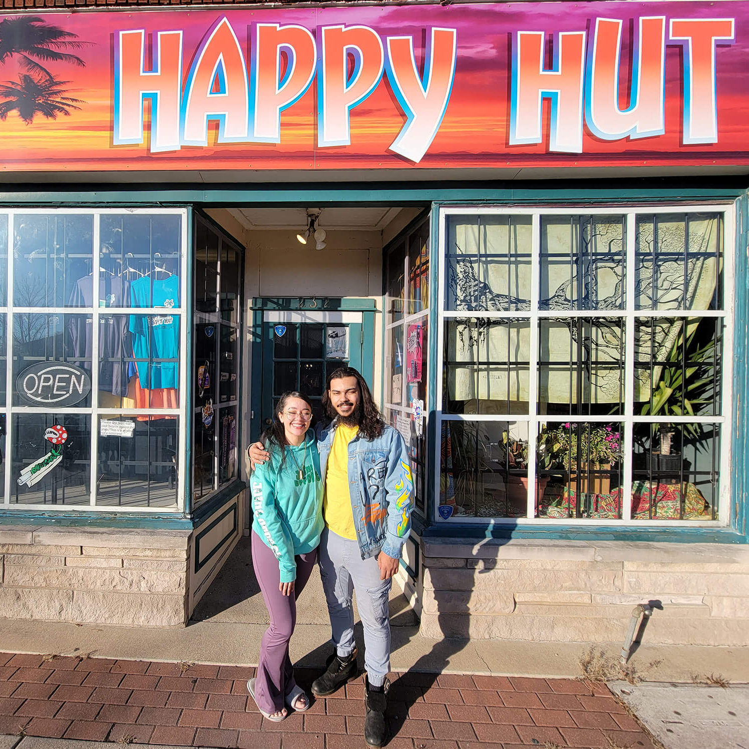 Exterior of Happy Hut shop with owners Deja Garrick in Decatur, IL